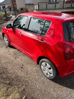 Suzuki Swift 1.3 - 7