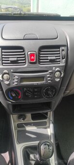 Nissan Almera 1.5 - 7