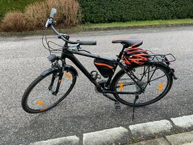 Trekingové kolo Kellys s odpruženou vidlicí SR Suntour a V-b - 7
