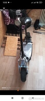 2x koloběžka nitro scooter,4x Baterie,1x Nabíječka - 7