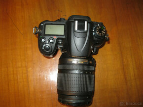 Nikon D 7000 Nikon Nikkor AF-S 18-105;mm VR DXs objektivem - 7