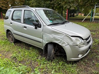 Suzuki Ignis 1,3 68 kw 2008 bourané - 7
