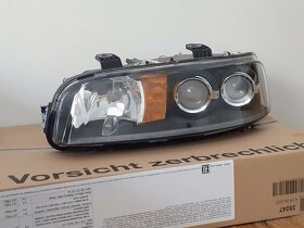 Fiat Punto II 99-03 světlomet levý č.dílu 89100449 - 7