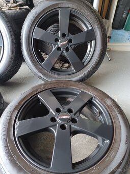 5x100 R16 6,5j et 38 Dezent cerne - 7