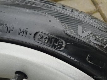 Alu kola Skoda 5x100 r16 6,5j et43 pneu 215/45/16 - 7