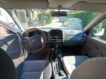 Nissan Navara Double-cab 2,5 TDI 4x4 - 7