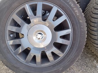 Alu kola Škoda 5x112, obuté zimní 215/60/16 99H ET37 Falken - 7