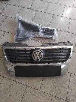 Vw B6 světla, roleta kufru,maska. - 7