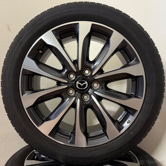 MAZDA CX-3 5x114,3 R18 ET50+LETNÍ 215/50R18 6,5mm - 7