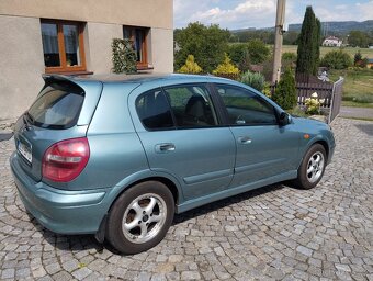 Nissan Almera 1,5 cm3 - 7