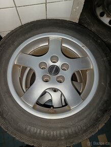 Zimní pneu ALU kola 114,3 - ET 40 - 215/65 R16 - 7