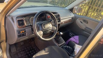 Suzuki Grand Vitara 2,5 V6 - 7