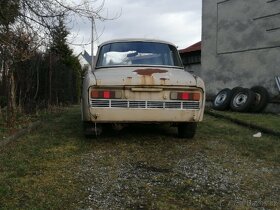 Š 100 - 7