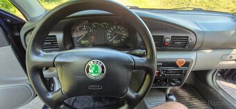 Škoda octavie 1.9 tdi 66 kw - 7