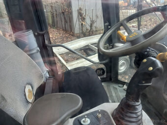 Kolový nakladač JCB 407 - - 7