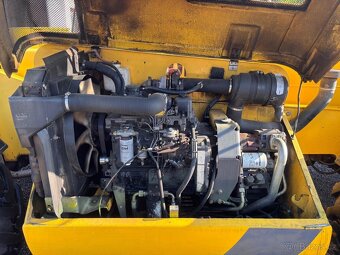 Prodám teleskopický Nakladač New Holland - 7