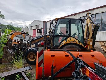 CATERPILLAR 428 E - 7
