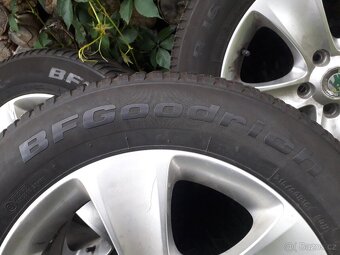 215/60R16 99H + originalni ALU Škoda 7x16 5x112 ET45 - 7
