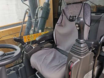 Kolové rypadlo CAT M314 F - 7