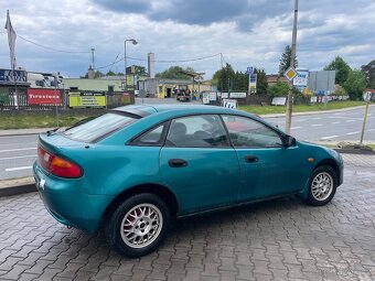 Mazda 323f 1.5 66 KW DOHC. Klima, el.okna, ALU kola - 7