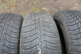 Plechový disk VW Škoda zimní pneu Bridgestone 215/60 R16 - 7