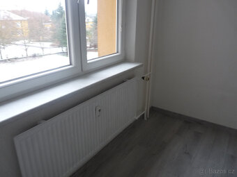 Pronájem kompletně zrekonstruovaného bytu 2+1 Spartakiádní 1 - 7