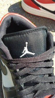 Jordan 1 Low Bred Toe - 7