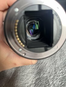 Objektiv Sony 28-70 mm f/3,5-5,6 OSS - 7