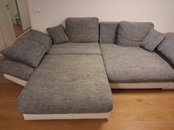 Velká rozkládací sedačka s úložným prostorem - 7