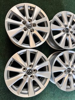 5x114,3 R17 Orig. alu disky Mazda - ET 50 - 7