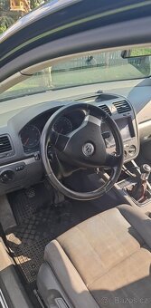 Golf 5 77 kW - 7