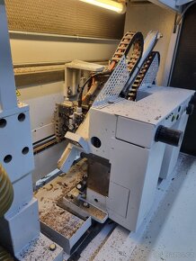 Olepovací stroj se zpětným dopravníkem HOMAG KAL 211 - 7