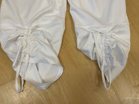 Bílé sportovní Capri kalhoty Nike vel. 38 - 7