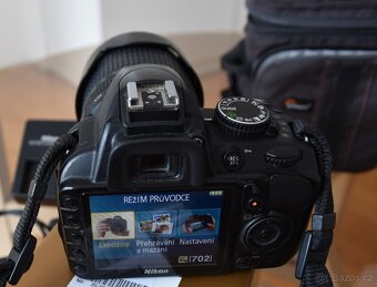 Nikon D3100 + Nikkor 18-55mm - 7