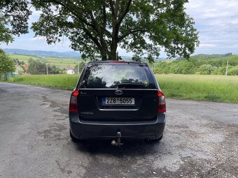 Kia Carens 2007 Benzín + LPG - 7