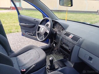 Škoda fabia 1.4mpi-50kw r.2002 combi stk platná - 7