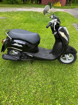 Sym Mio 100, 125 - 7