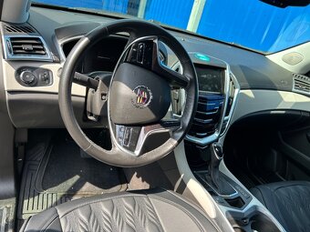 Cadillac SRX - 7