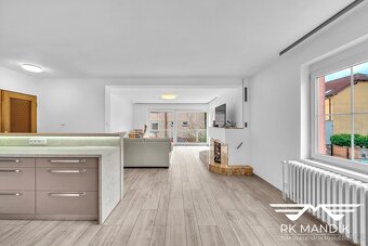 Prodej rodinného domu s garáží dílnou a zahradou - Praha - K - 7