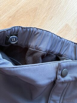 Zateplené šusťáky vel. 134, softshellové kalhoty vel. 152 - 7