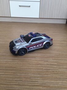 Transformer, traktor, velké zvukové policejní auto - 7