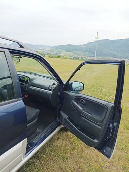 Suzuki Grand Vitara 2.0 - 7