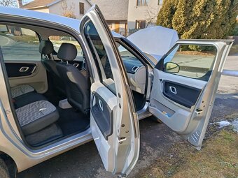 Roomster 1.4 benzín - 7