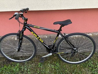 Trekové kolo KELLYS Axis – 28” kola - 7