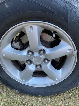 Mazda Tribute 2,3 - 7