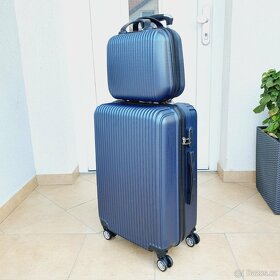 Cestovní skořepinové kufry - nové - 7