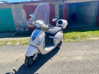 Skůtr 125 - 7