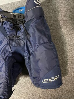Nové juniorské hokejové kalhoty CCM U+ - 7