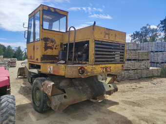 Kolový bagr DH 113 - 7