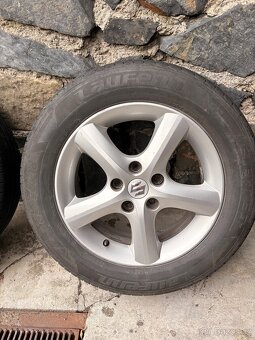 Suzuki SX4 16” original kola, letní pneu - 7